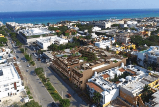 Aerial view of Playa del Carmen shoreline and city toward the Caribbean