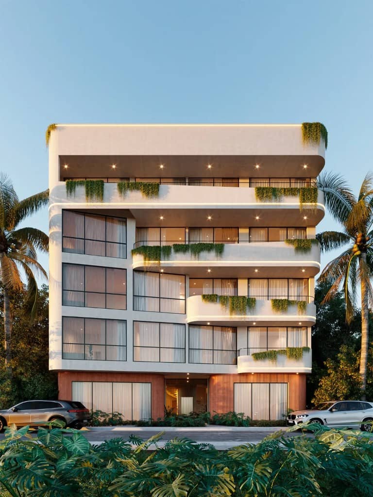 Aldea Zama condo facade with easy access to the Beach Road shuttle