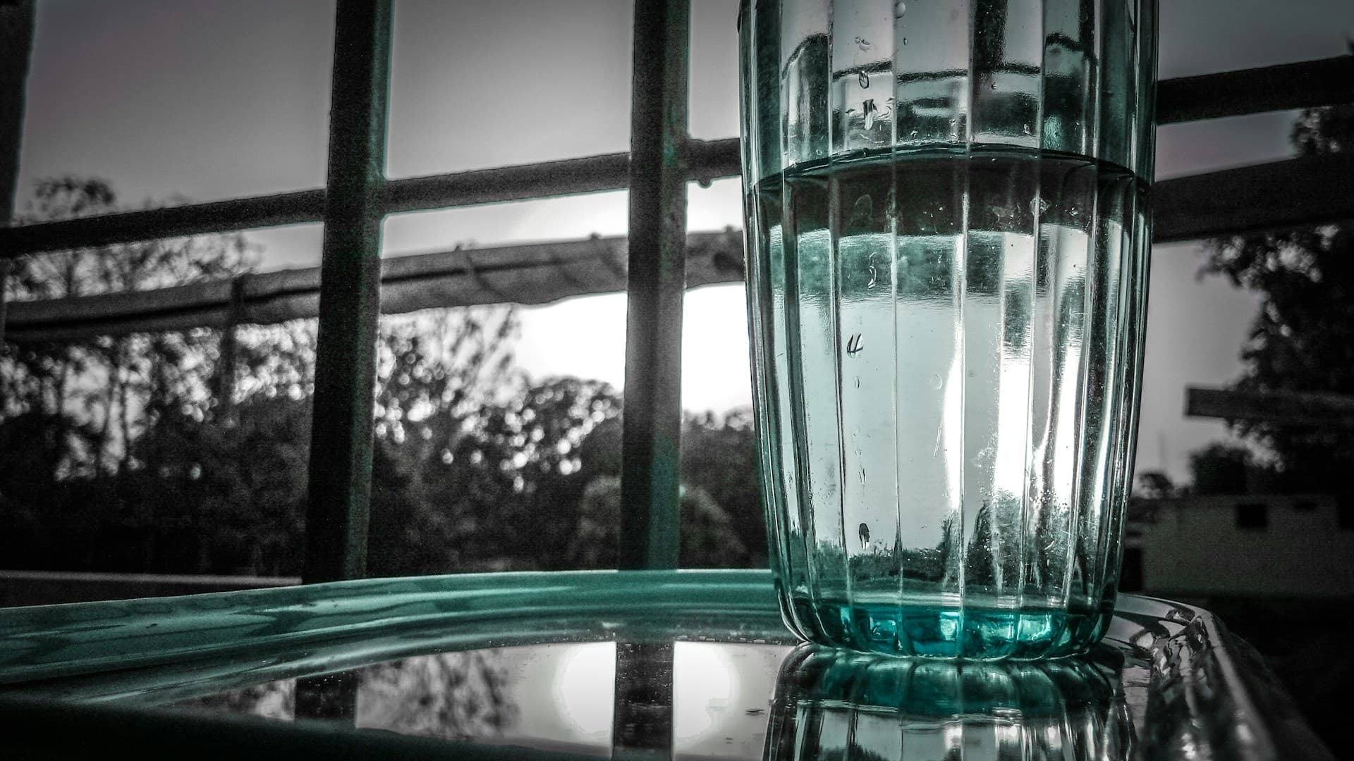 Clear drinking glass filled with fresh water